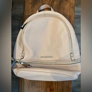 Michael Kors pink backpack purse